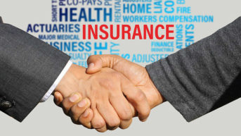 insurance text with handshake