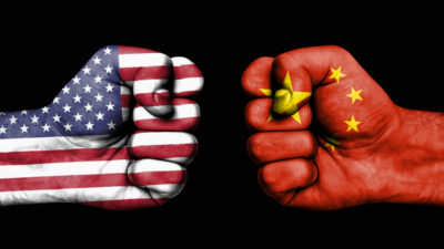 Conflict between USA and China, male fists - governments conflict concept