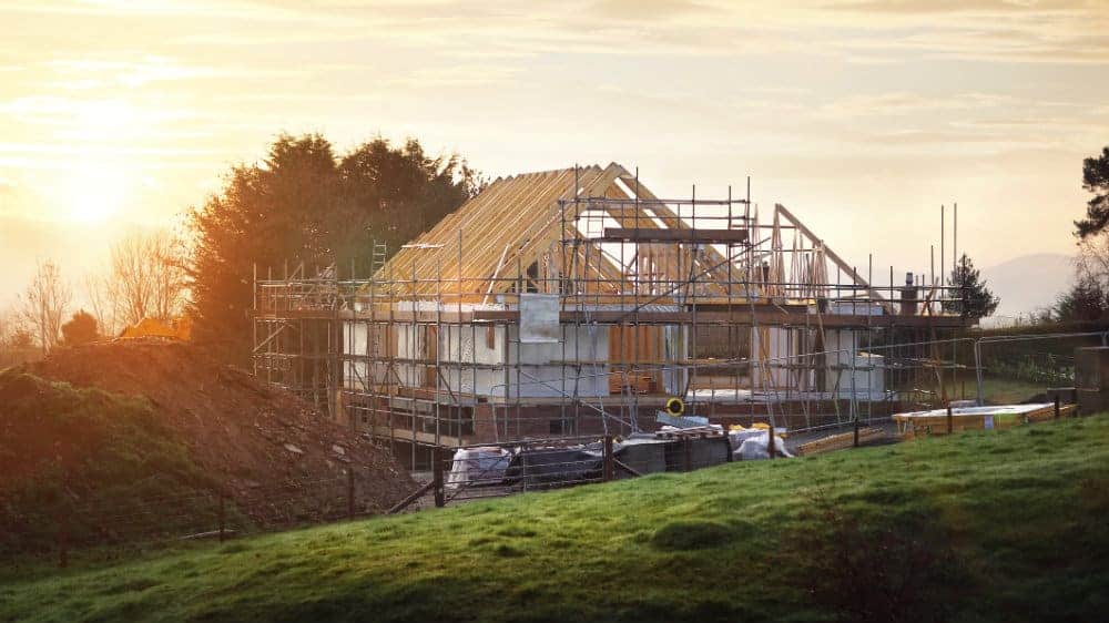 A house being constructed in the countryside