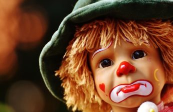 Close up of a cute, sad clown doll