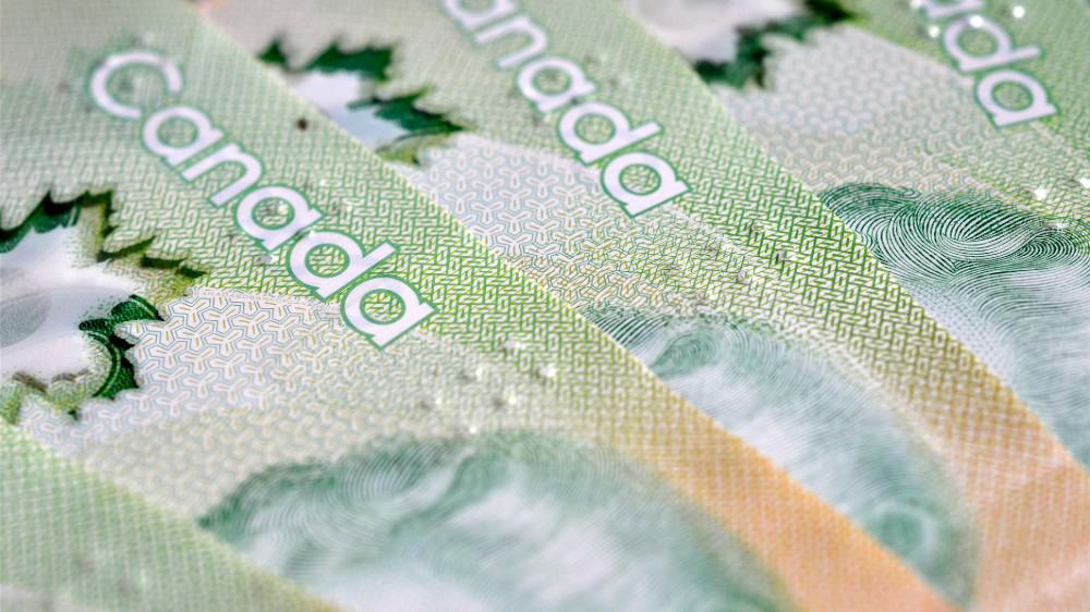 A close up image of Canadian $ 20 Dollar bills