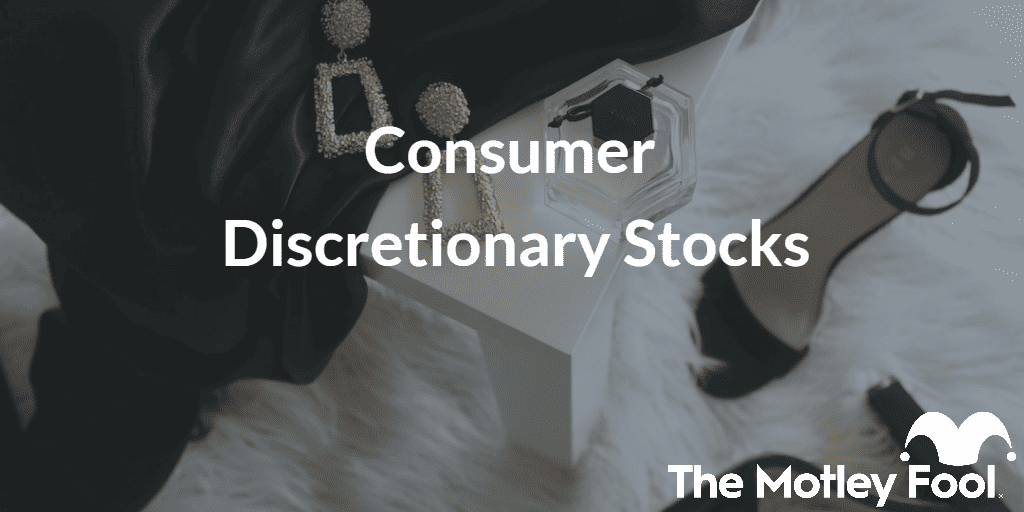 Bed with luxury goods on it with the text “consumer discretionary stocks” and The Motley Fool jester cap logo