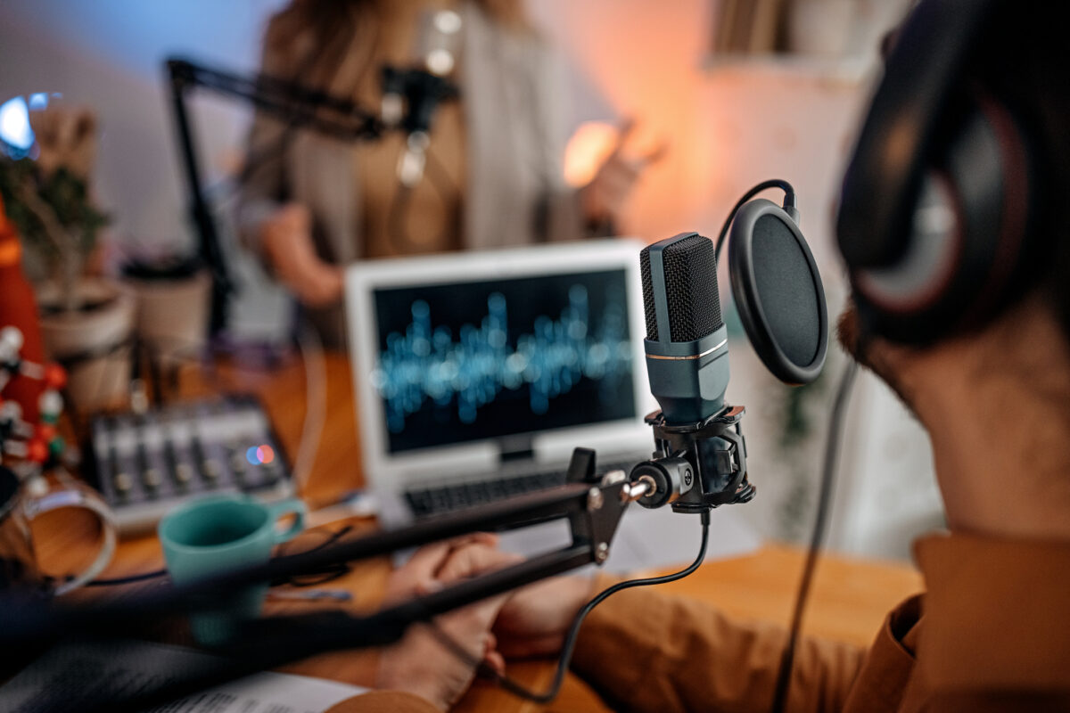 Young people recording podcast in studio