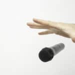 a person drops a microphone