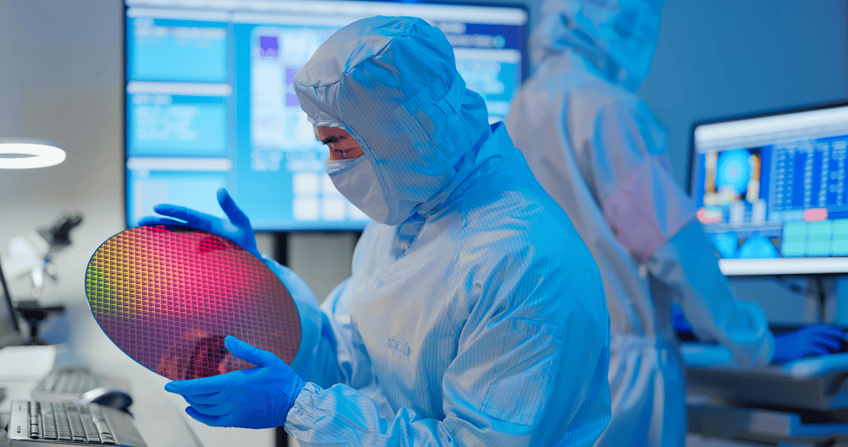 Technician looking at silicon wafer-GettyImages-1363604154-1201x633-30e6268