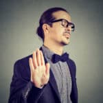 man gives stopping gesture