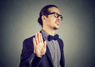 man gives stopping gesture