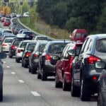 Traffic jam with rows of slow cars